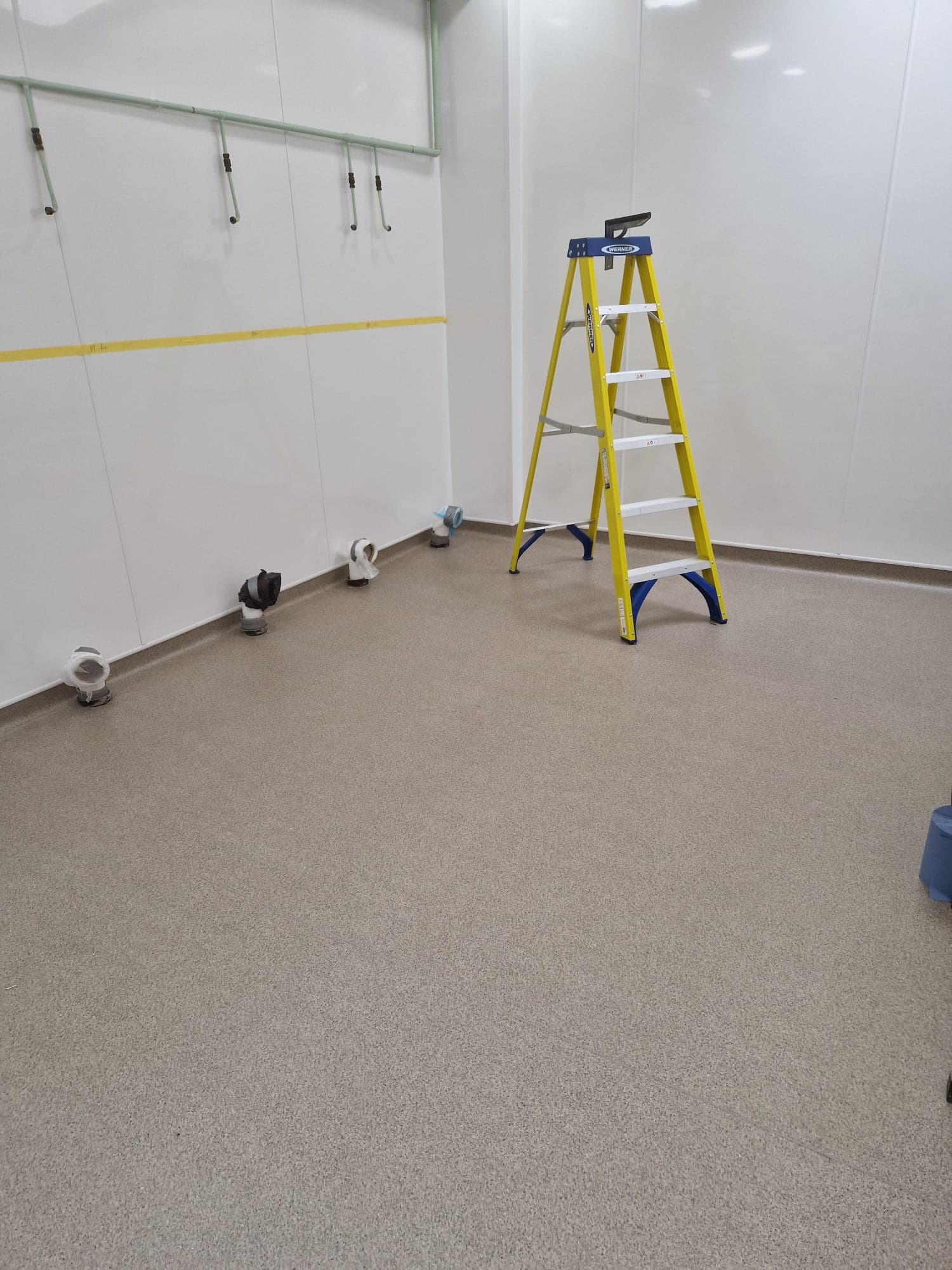 Luxury vinyl plank running through an open-plan space