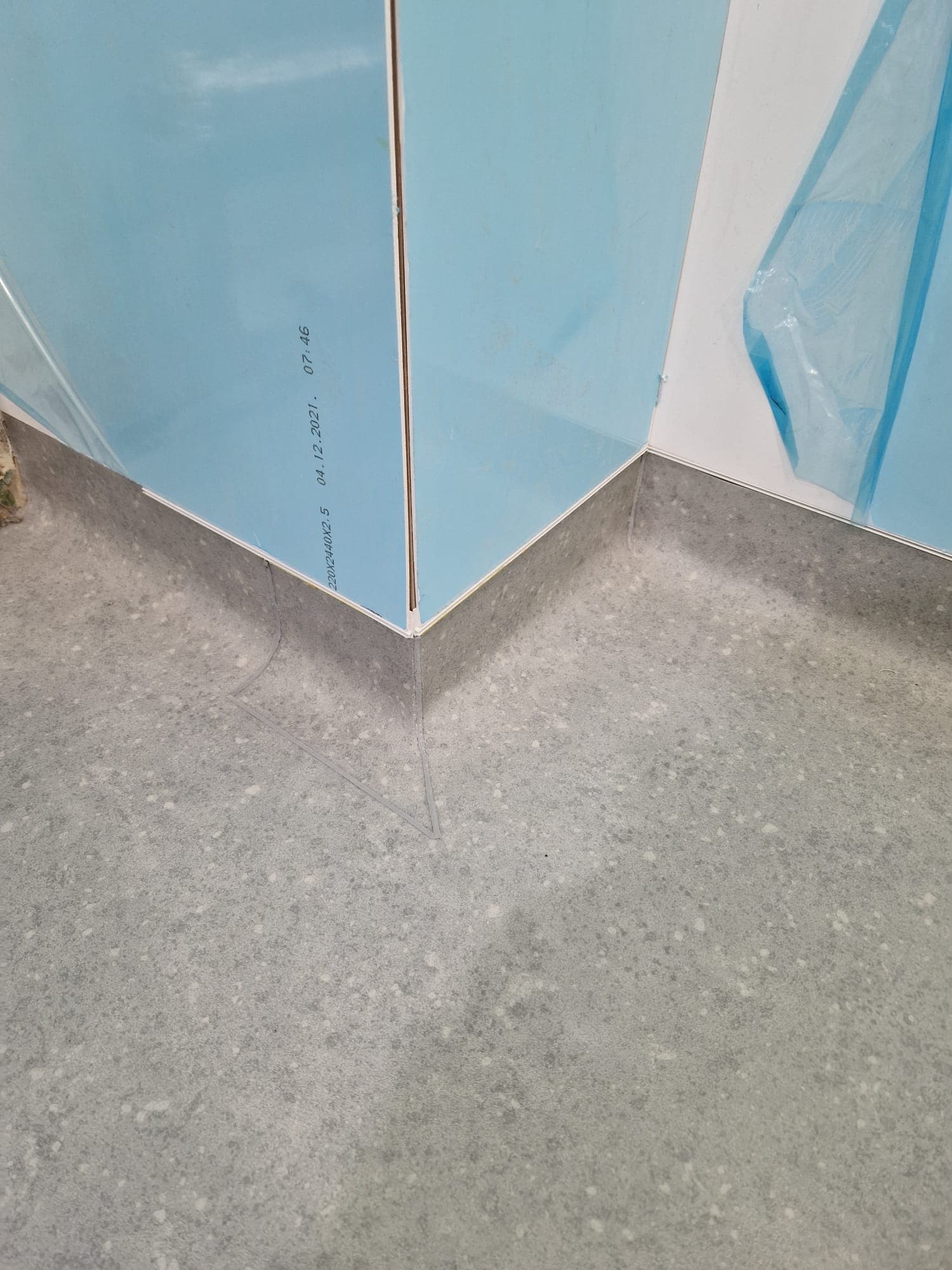 Fully welded wet room flooring with coved upstand, Derby healthcare install